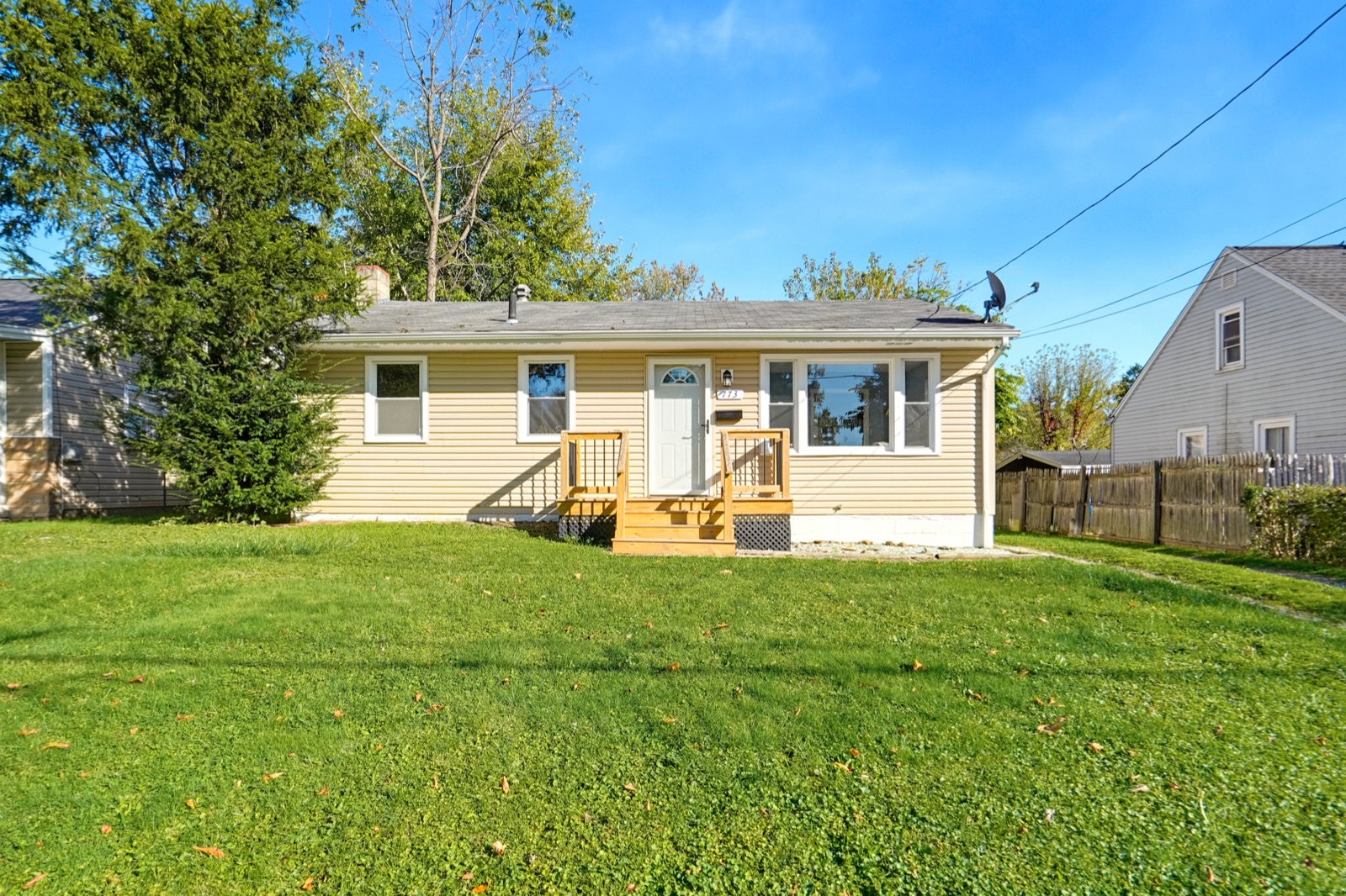 Front of the home and yard